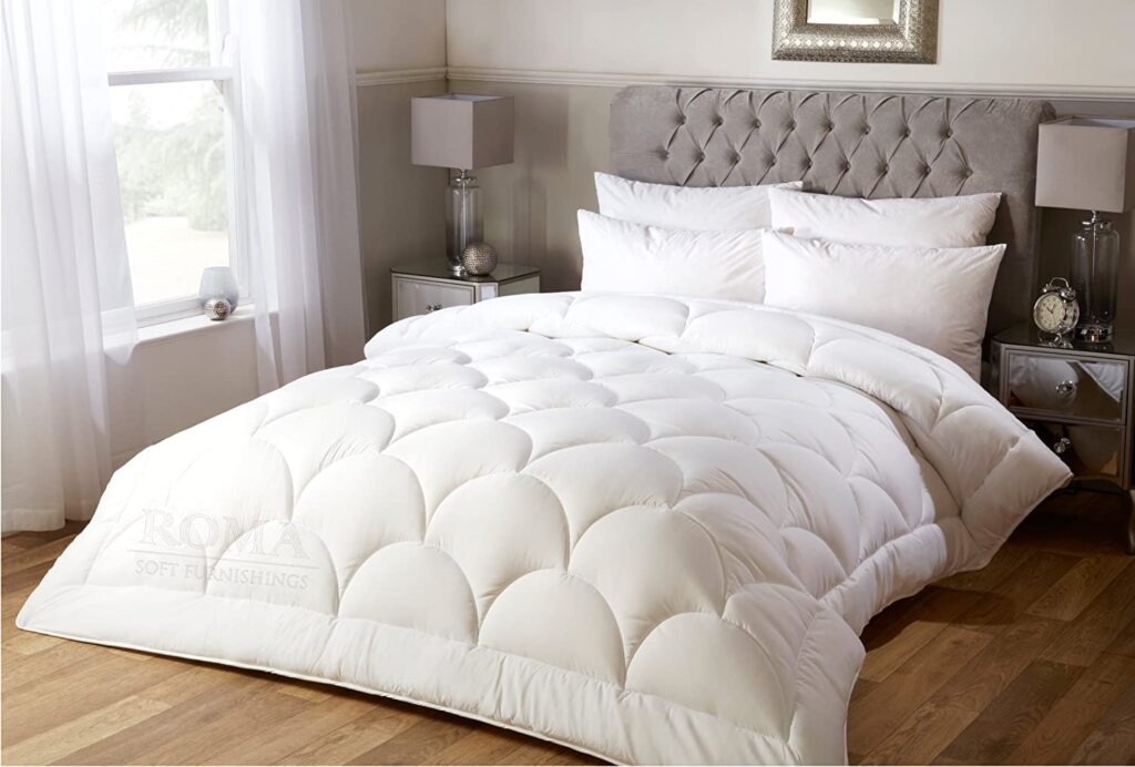 White duvet on an upholstered bed