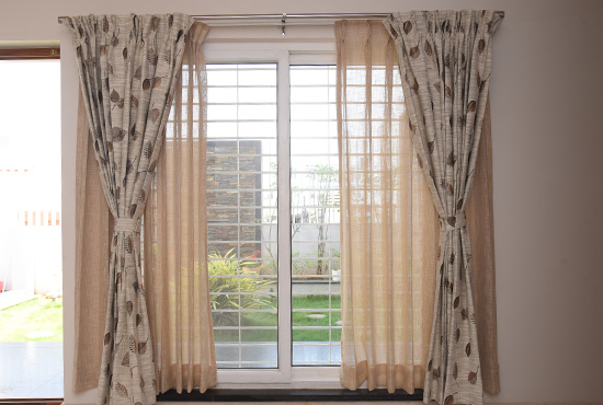 A pair of blackout curtains in a living space