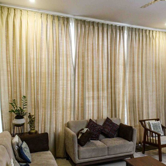 Textured woven curtain in a living room